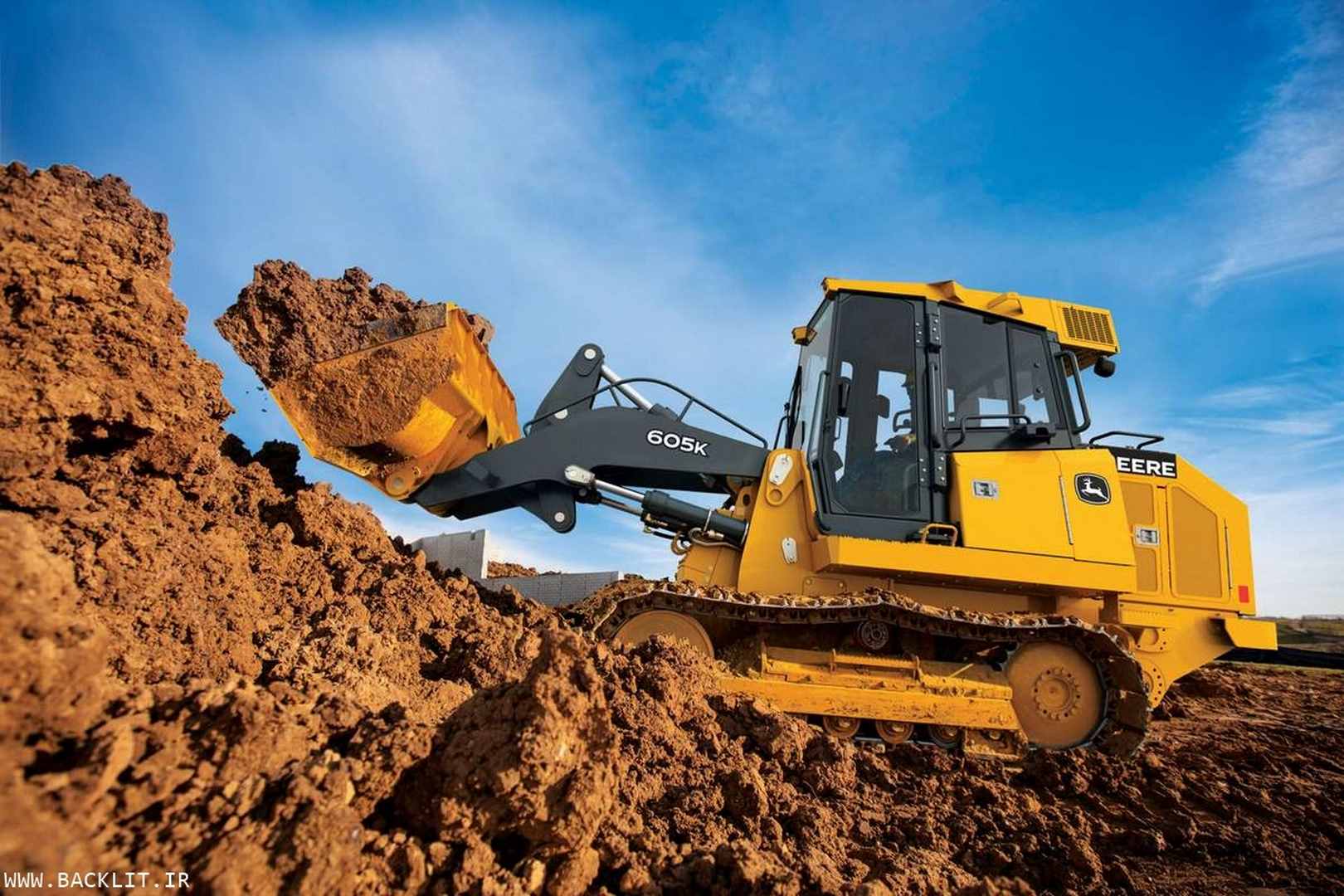10775